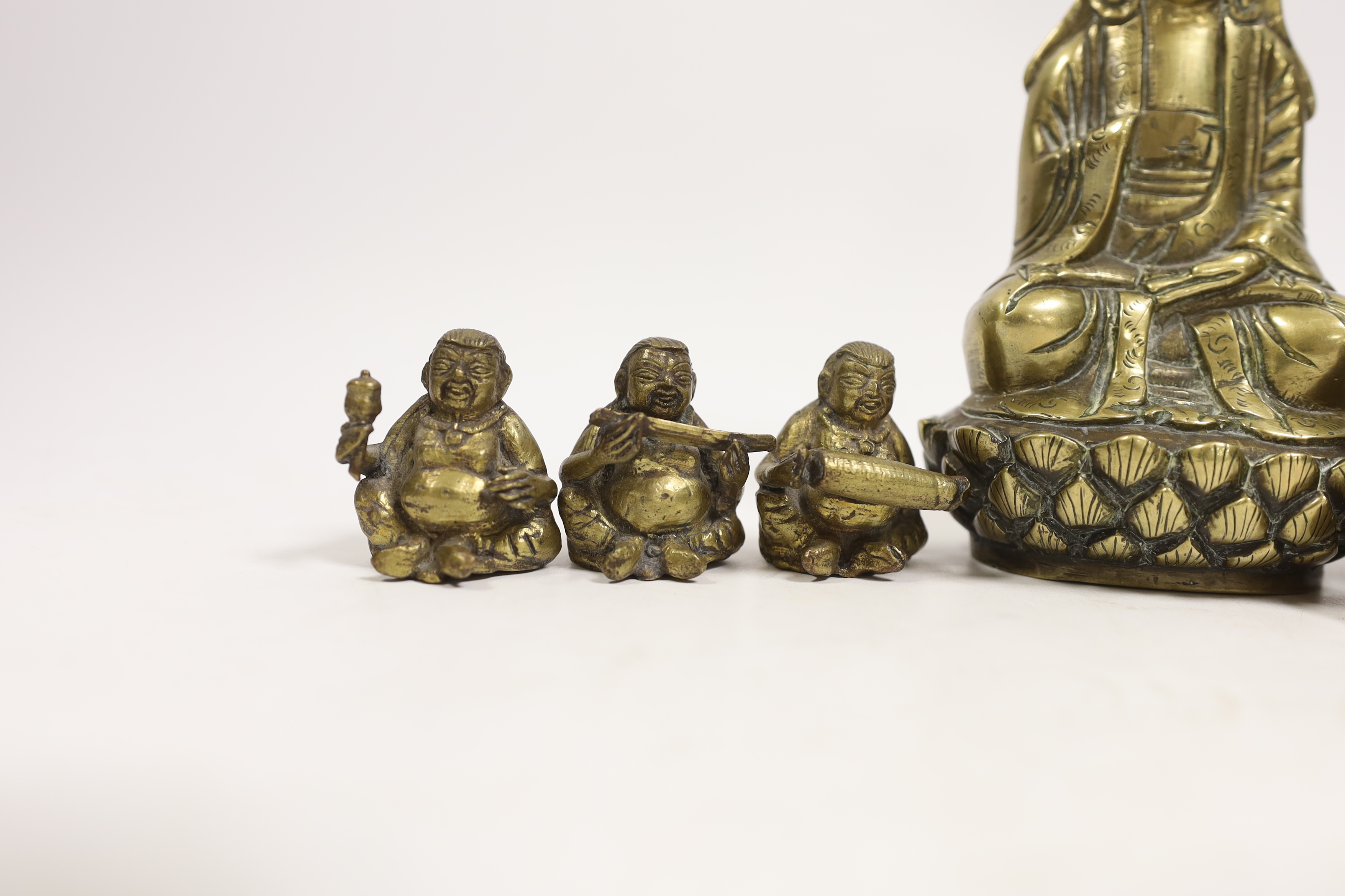 A Chinese bronze Buddha, a soapstone figure, etc, largest 15cm high